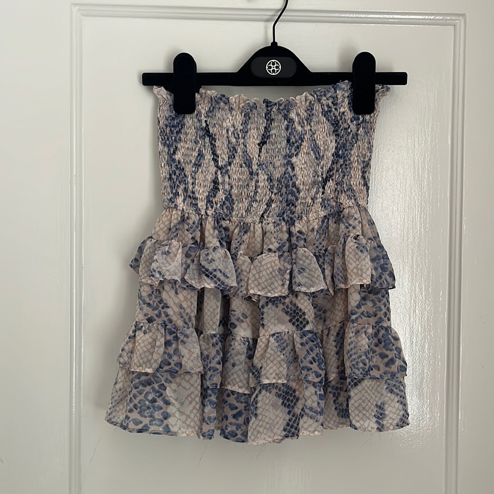 blue, white and pink ruffled skirt with snakeskin pattern